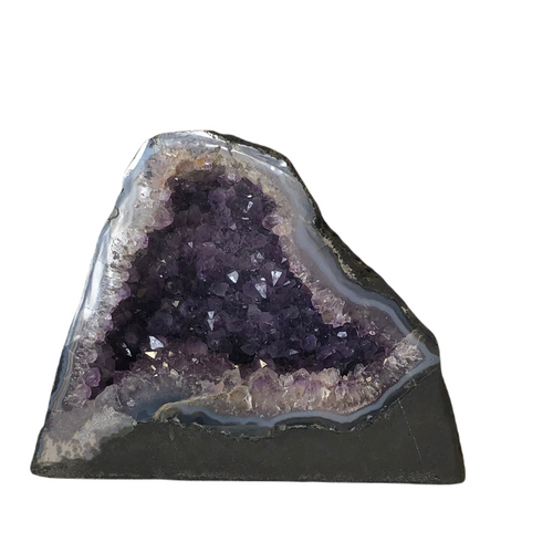 Front Side Of Amethyst Geode Cathedral Decorating With Rocks And Minerals, Black Base With  Blue Agate, And White And Purple Crystals