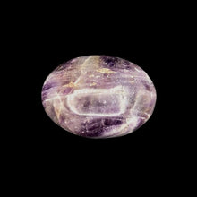 Load image into Gallery viewer, Polished Purple And White Lined Chevron Amethyst Palmstone In Artificial Light
