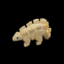 Load image into Gallery viewer, Left Side Of Polished Stegosaurus Soapstone Figurine, Tan And Orange In Color
