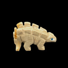 Load image into Gallery viewer, Right Side Of Polished Stegosaurus Soapstone Figurine, Tan And Orange In Color
