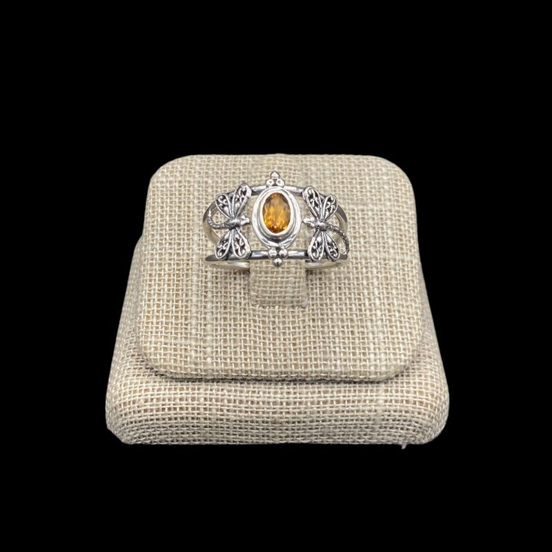 Front View Of Sterling Silver Dragonfly And Citrine Gemstone Ring, Band Is Polished Silver In Color And Gemstone Is A Brigth Citrus Orange Color