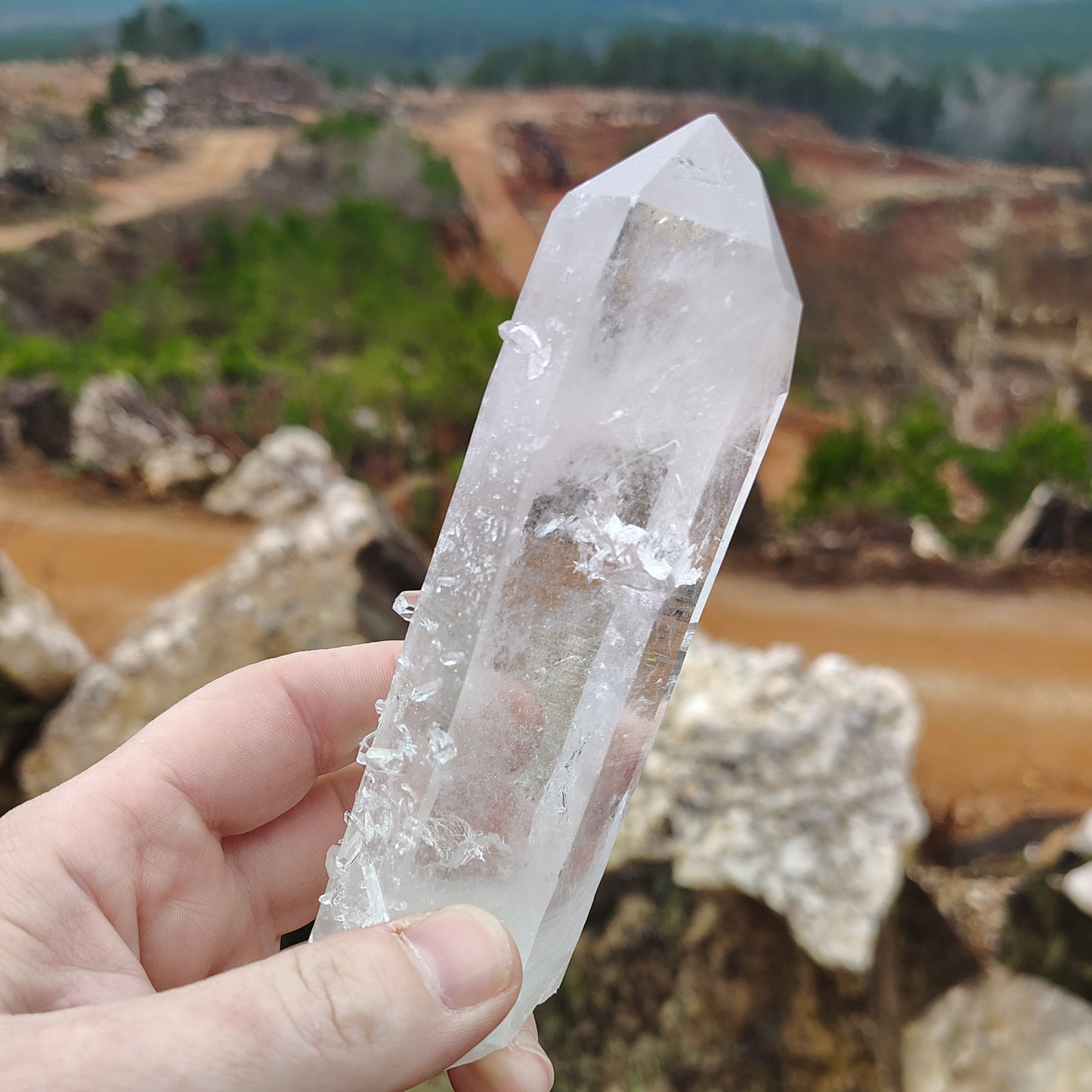 On the left side of this large quartz point you can see a infraction a little past its midsection.