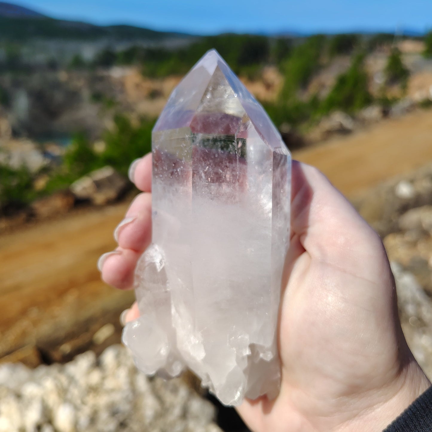 This is the back side of this Quartz crystal point, and is half clear and half white in color.