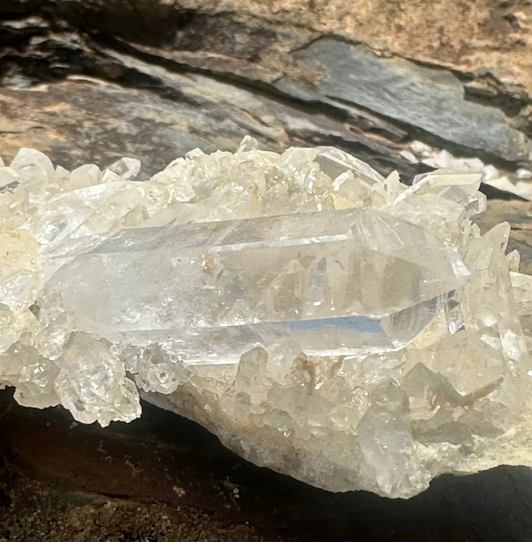Crystal Cluster sitting on a boulder