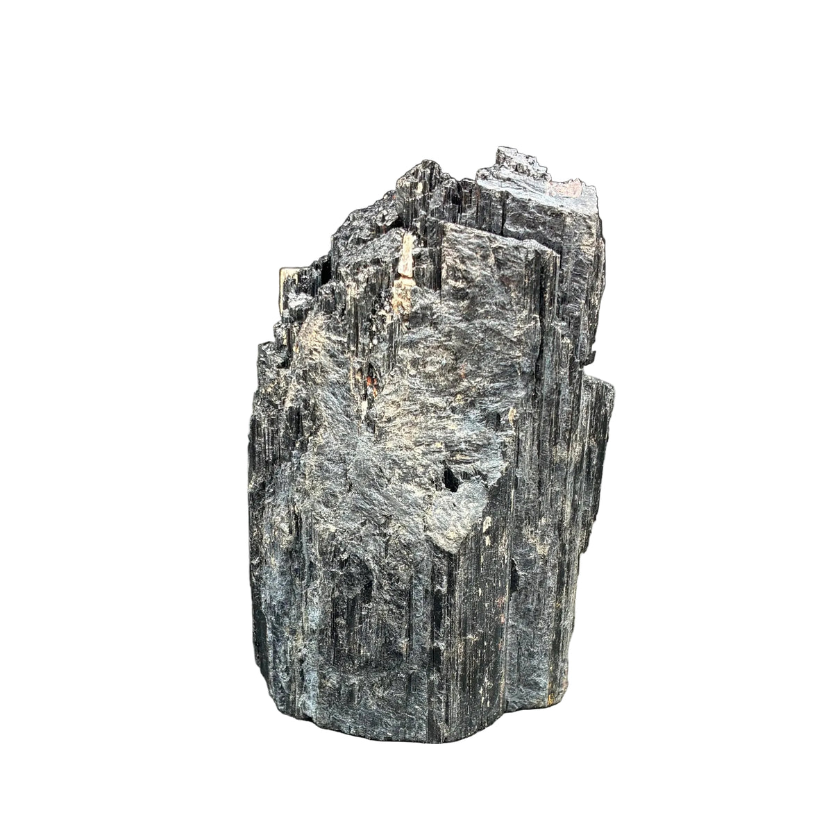Back side of  this black tourmaline, in front of a white background.