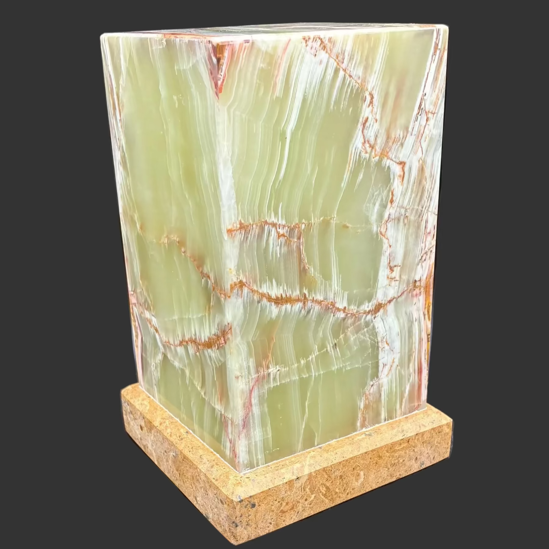 This is the side view of this polished banded onyx table lamp, with the light turned off.
