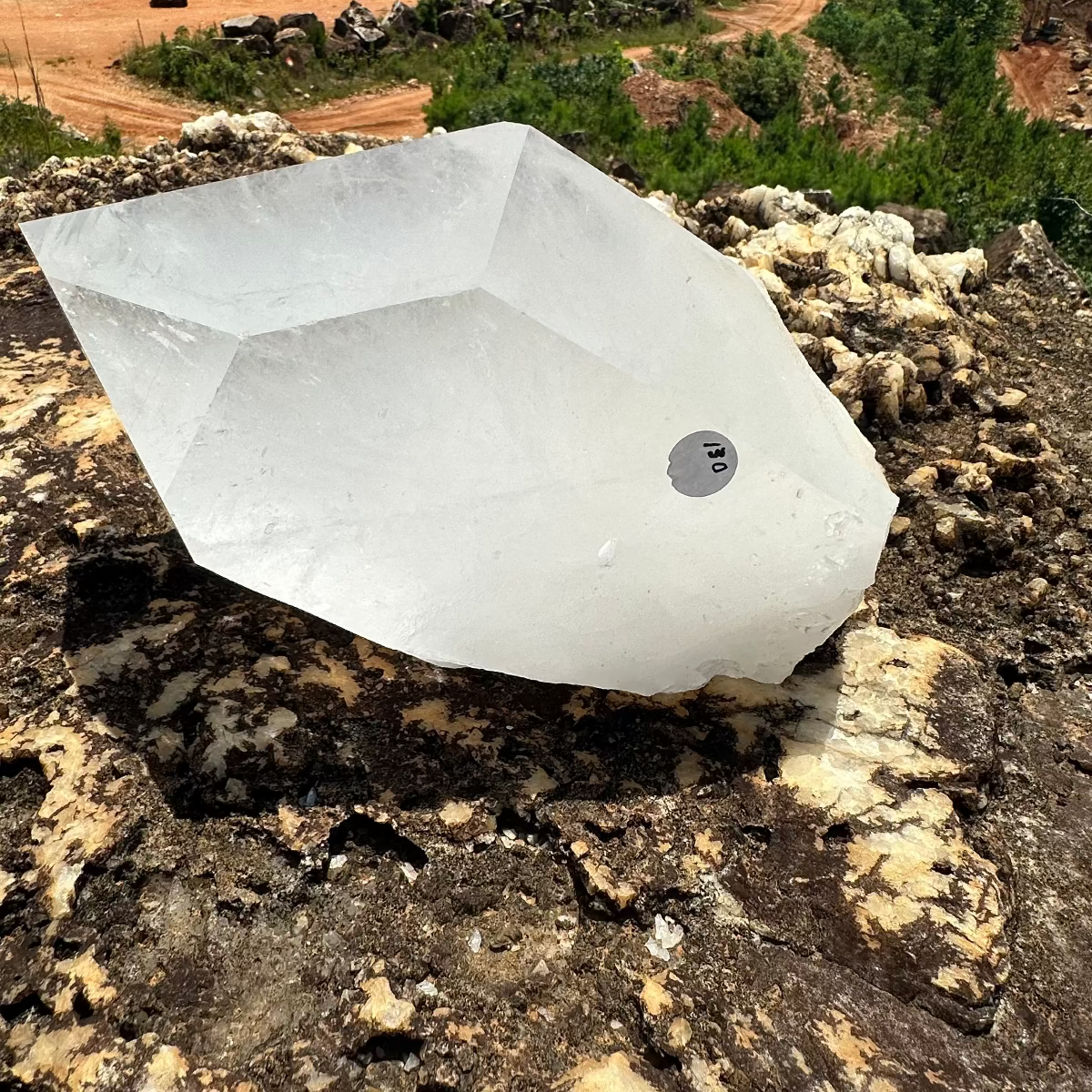 Side View of Large Crystal Point showing 130 inventory sticker