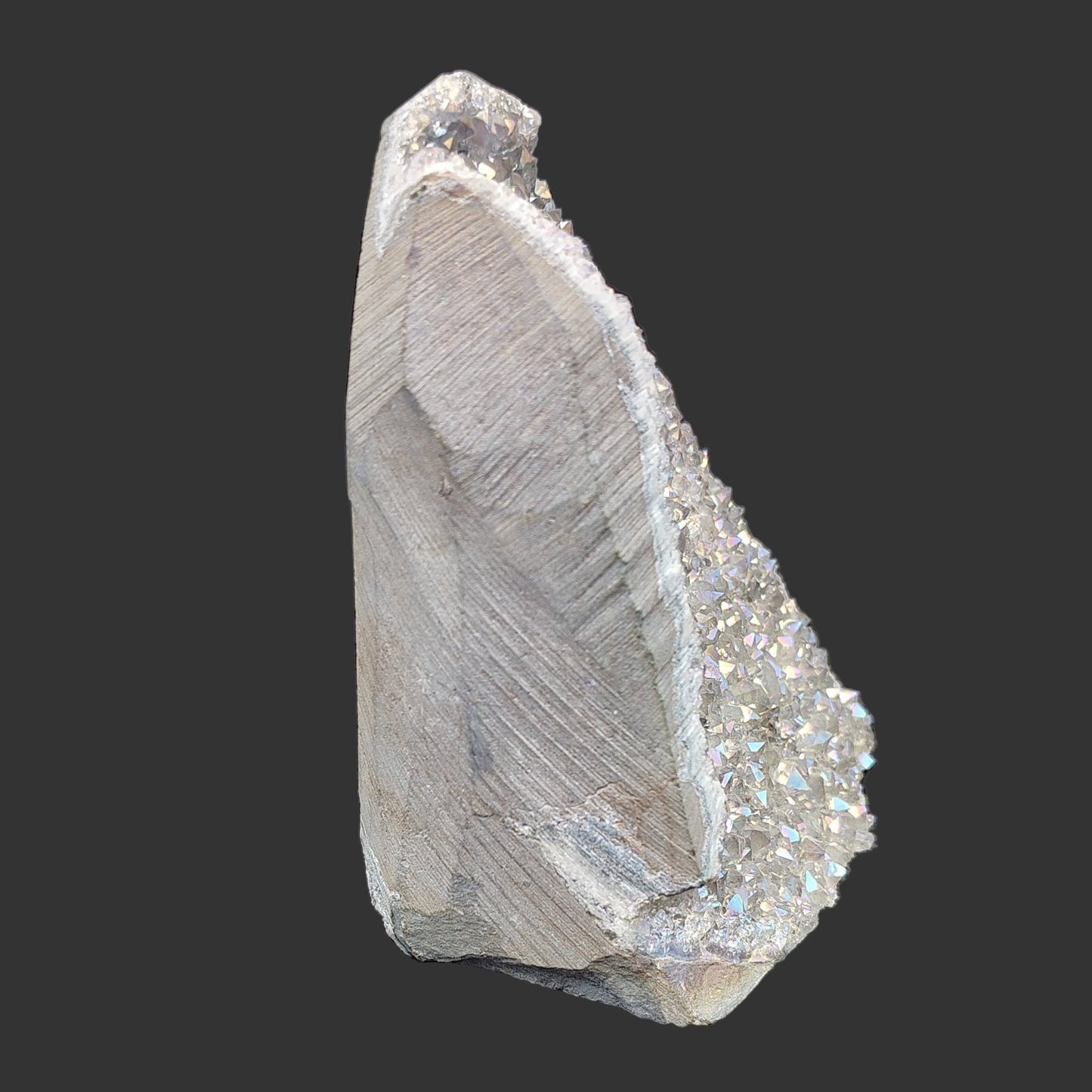 This is the right side of this angel aura amethyst crystal cluster.