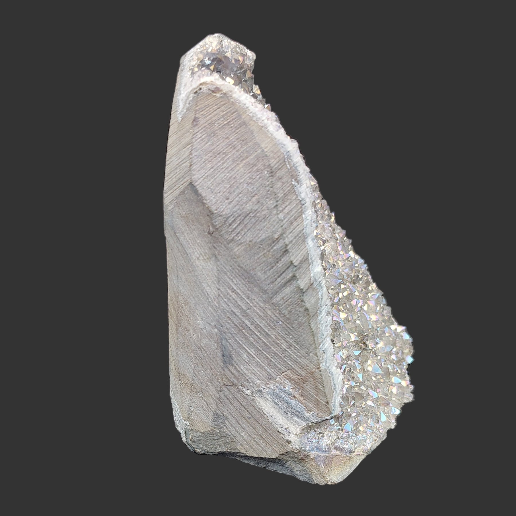 This is the right side of this angel aura amethyst crystal cluster.