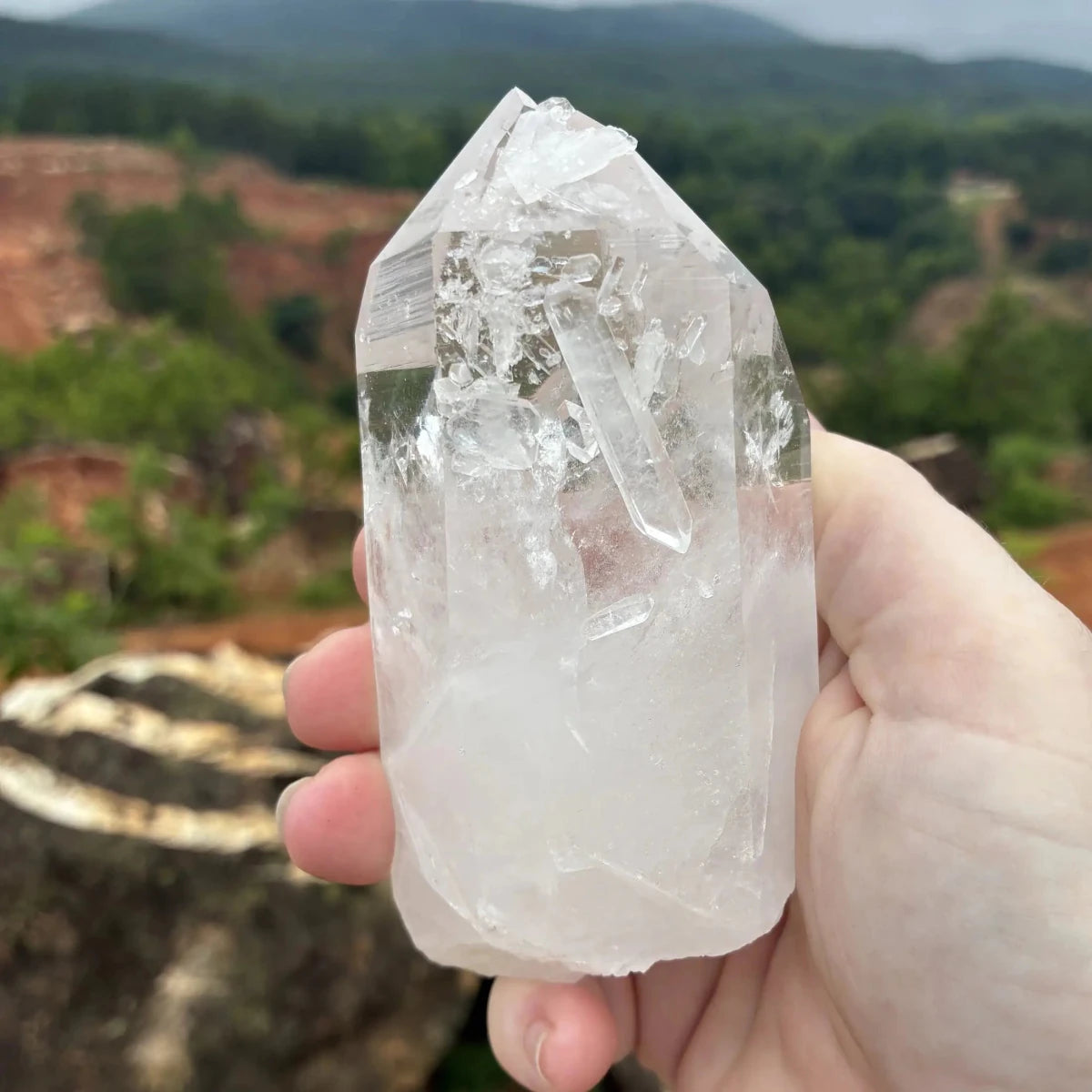 Front side of this Quartz crystal point outdoors.