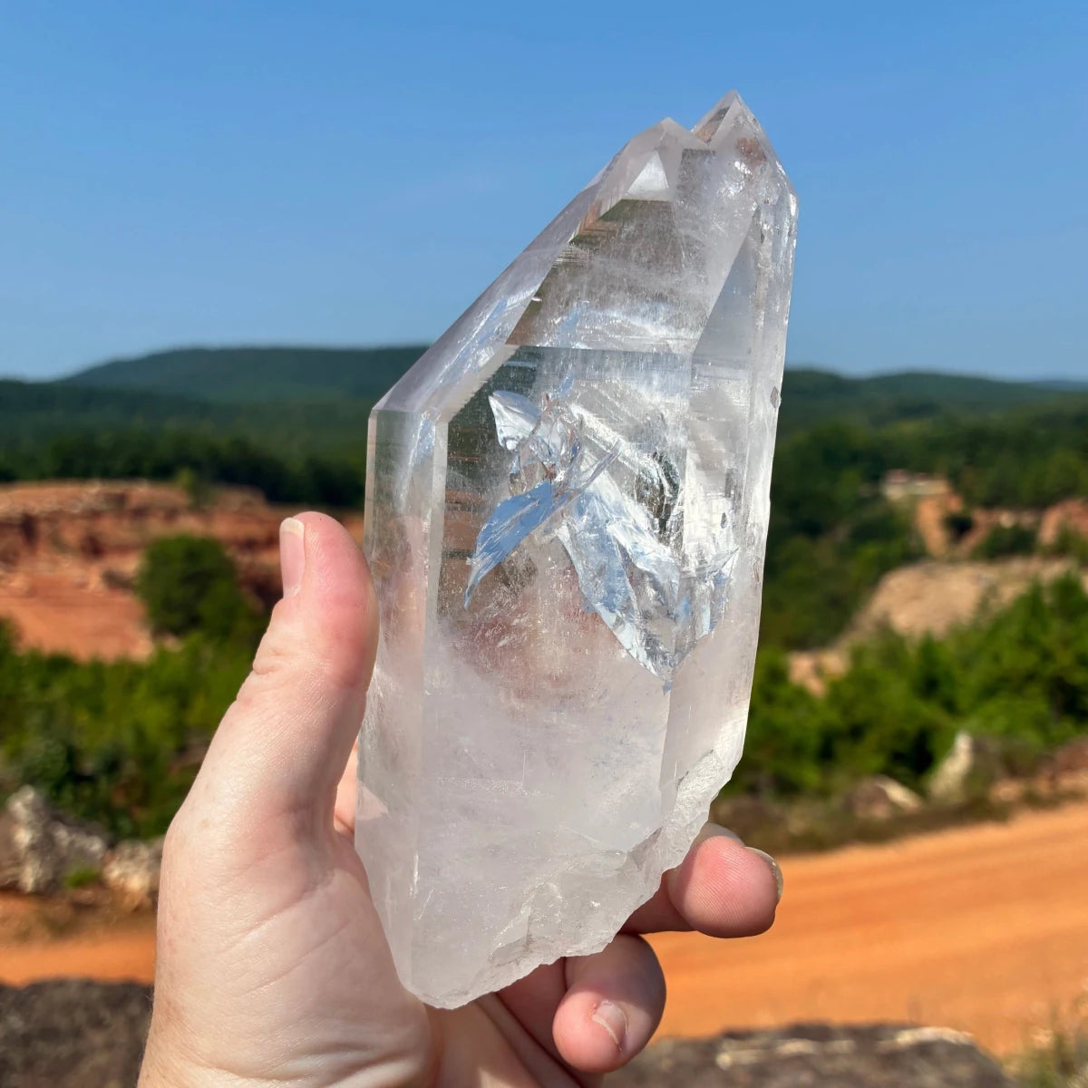 Left side of this quartz crystal point, in the outdoors.