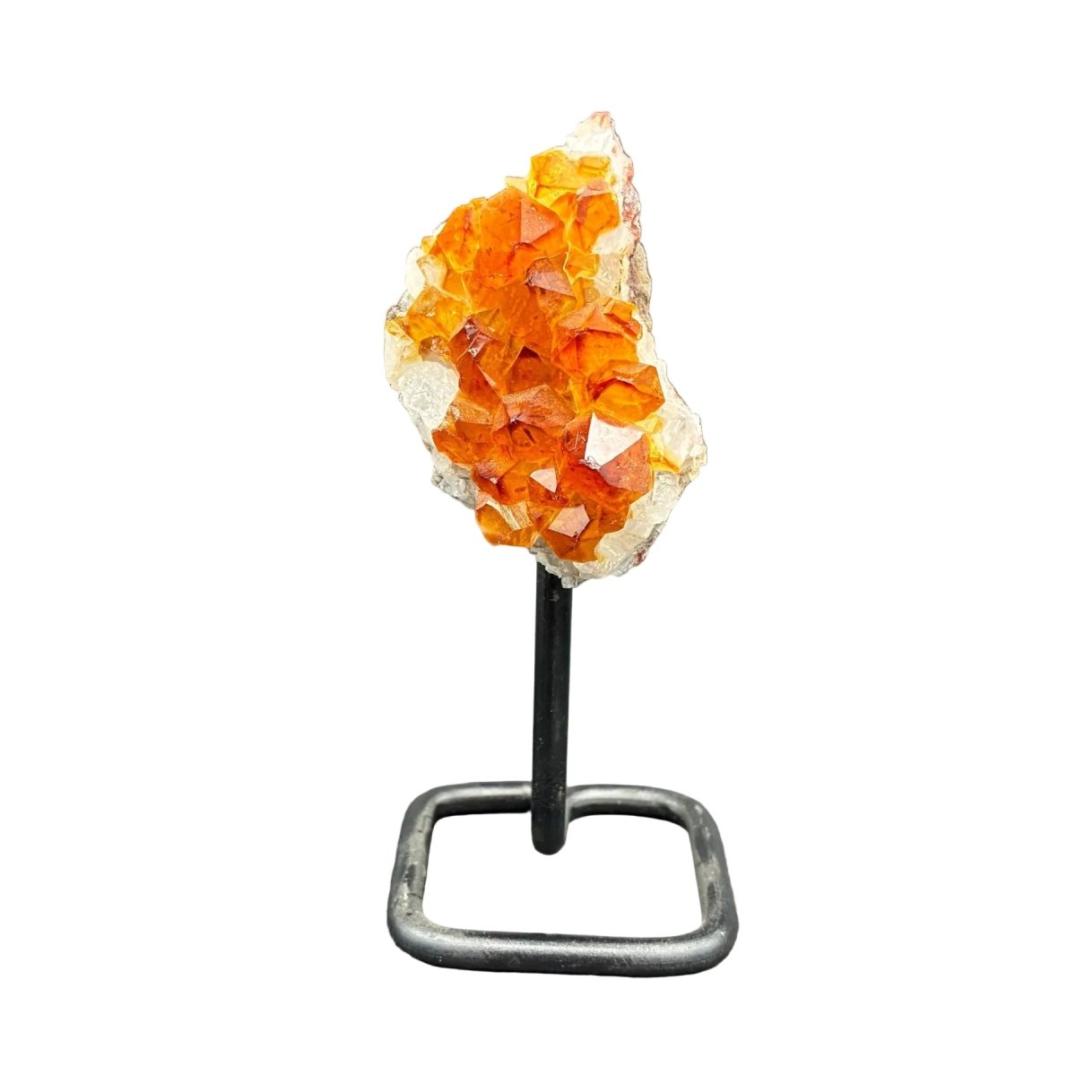 Front side of this Citrine cluster on stand, in front of a white background.