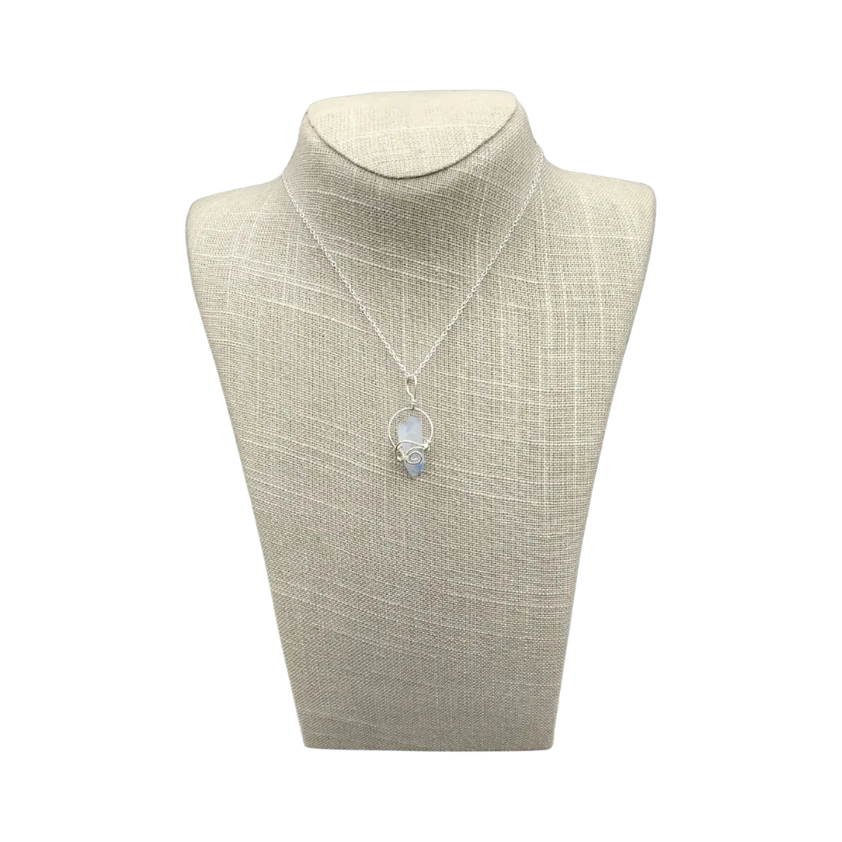 This is the front side of this Sterling Silver wire wrapped blue Dumotierite crystal necklace