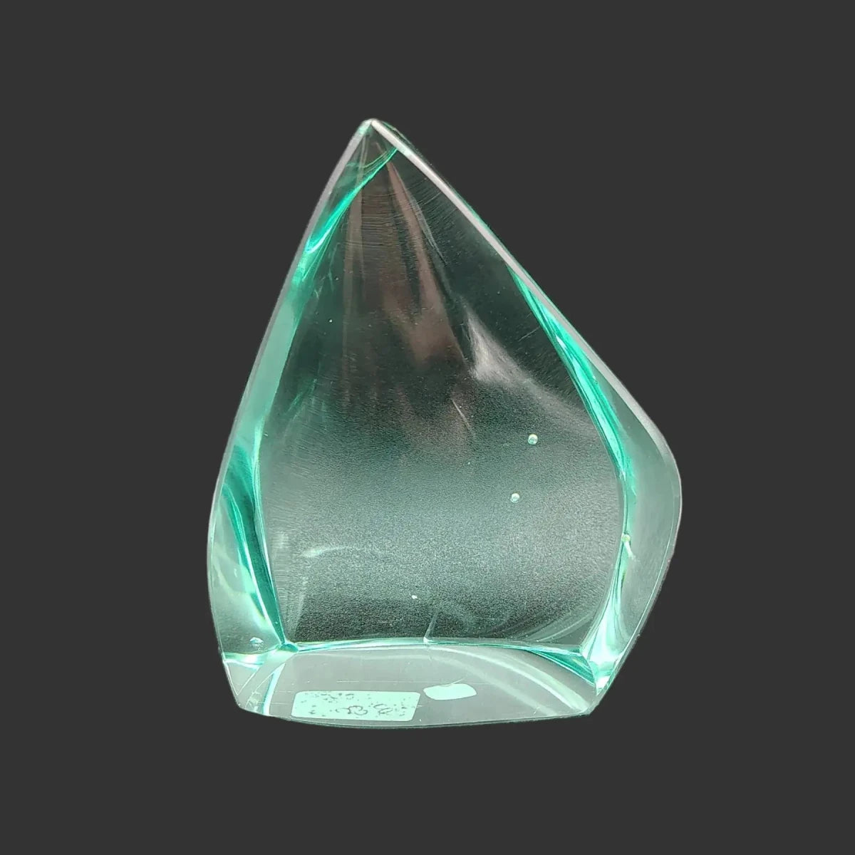 This is the back side of this polished blue green obsidian glass freeform.