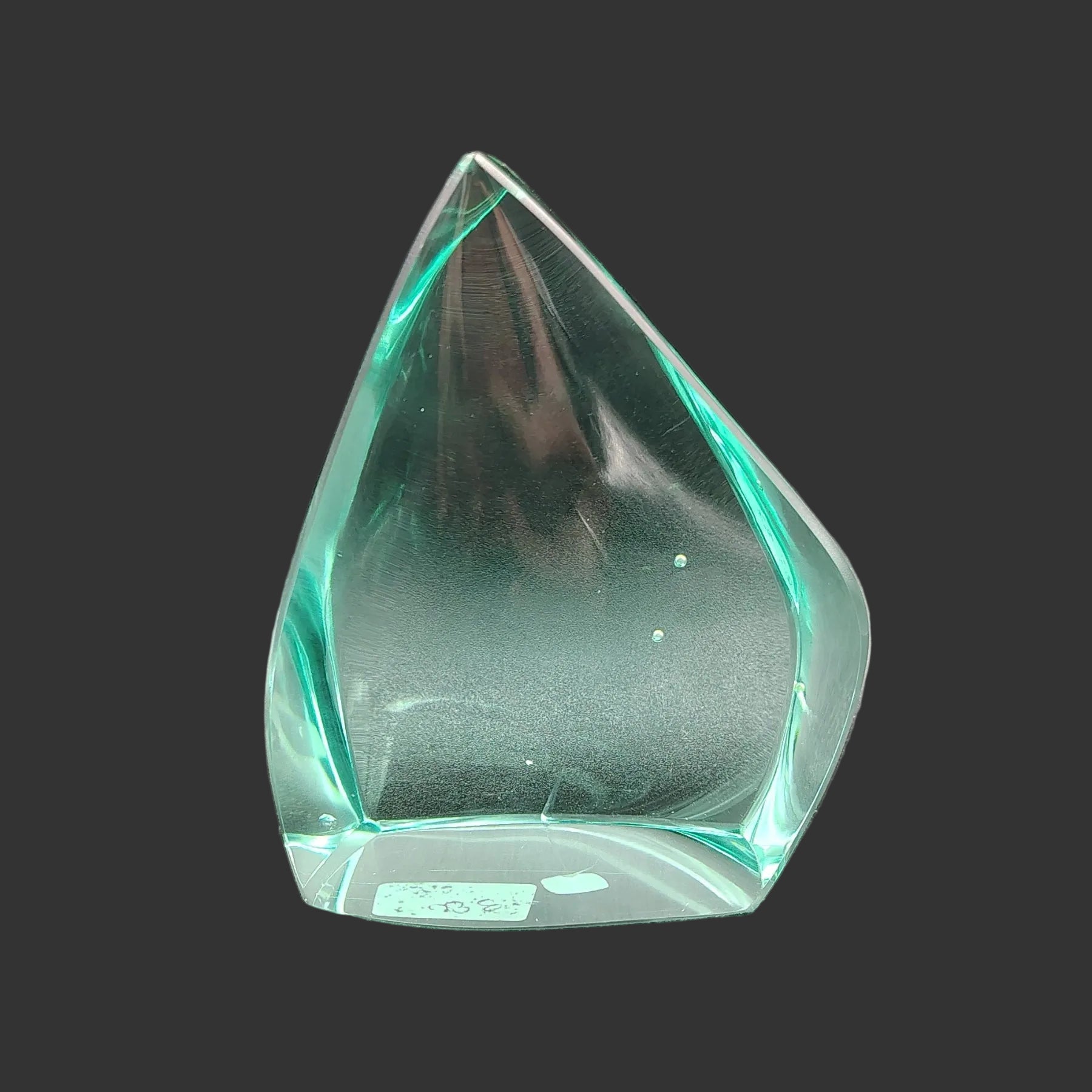 This is the back side of this polished blue green obsidian glass freeform.