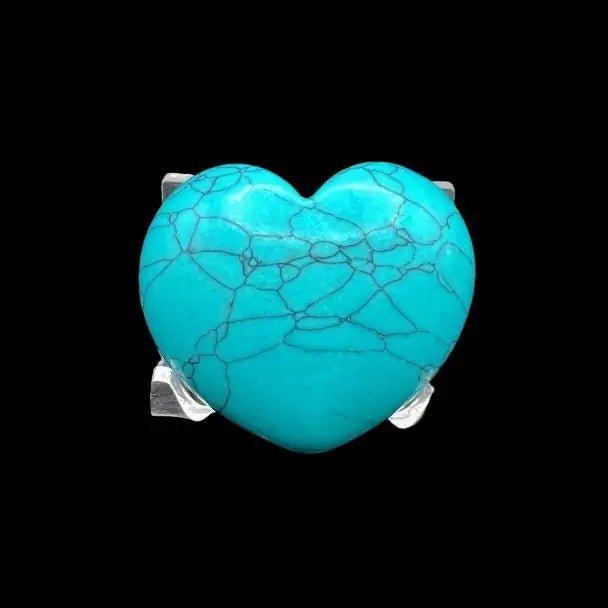 Blue Howlite Heart on a display