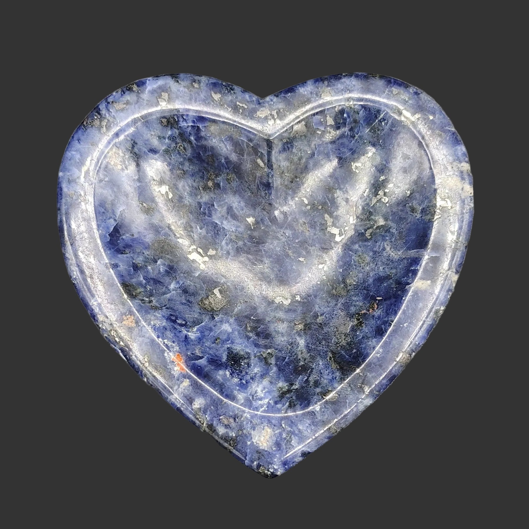 This is the top view of this hand-made polished blue sodalite heart trinket bowl.