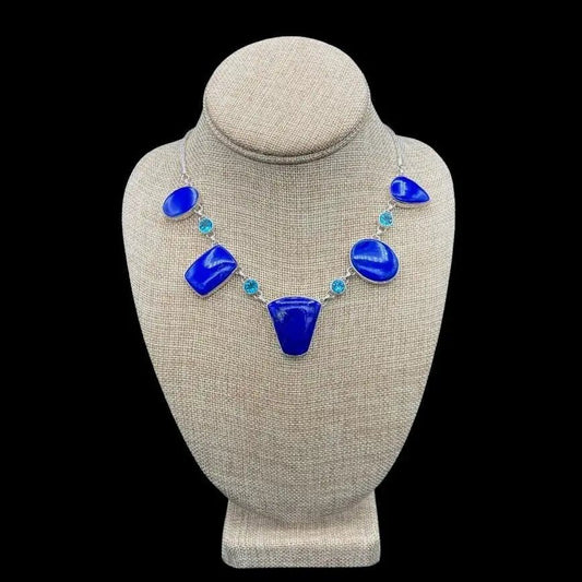 Blue Stone Necklace On A Beige Neck Display