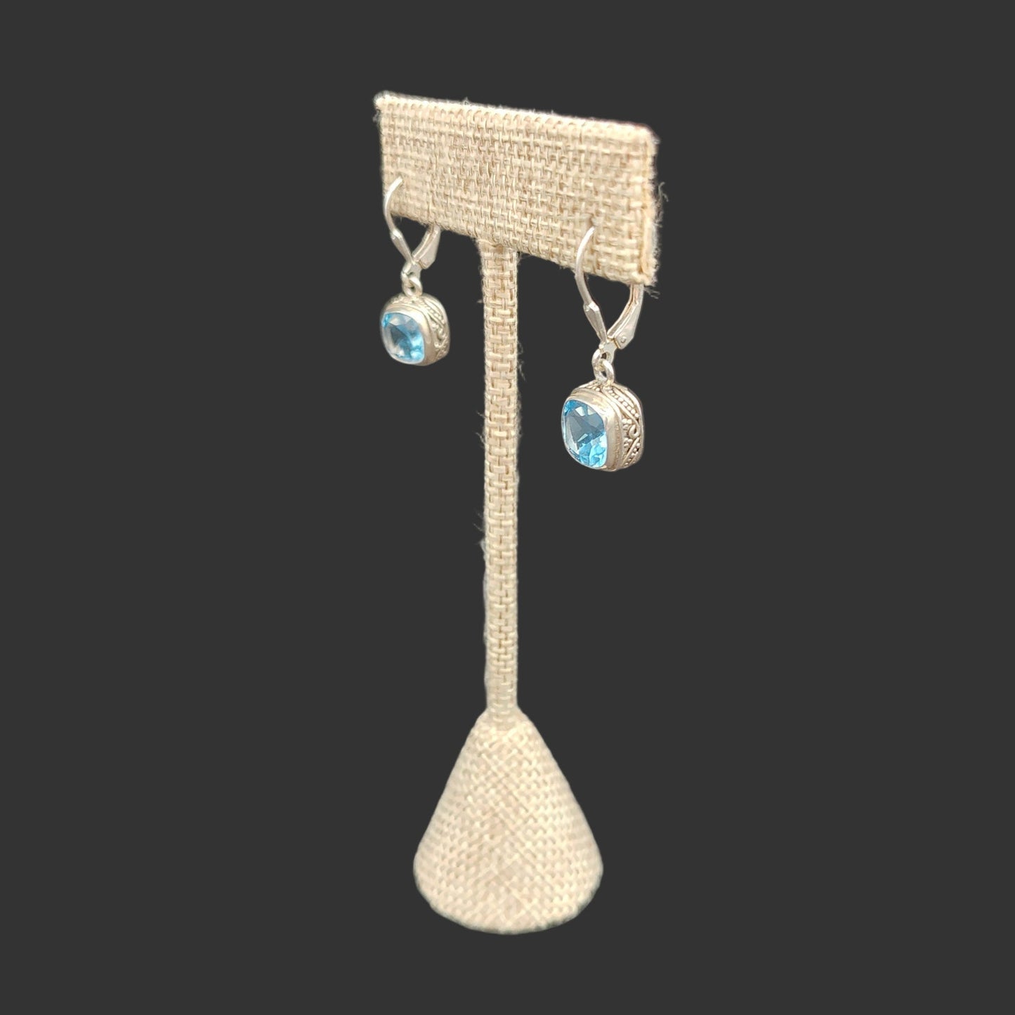 This is the side view of these sterling silver and blue topaz earrings