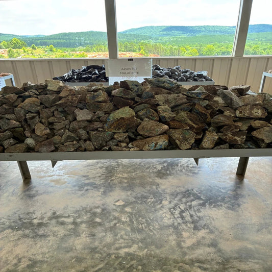 Bulk view of Azurite Malachite on a table outdoors.