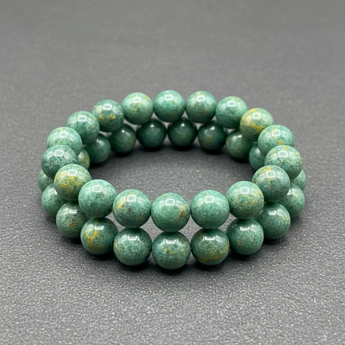 Bracelet made out of cut and polished green bloodstone.