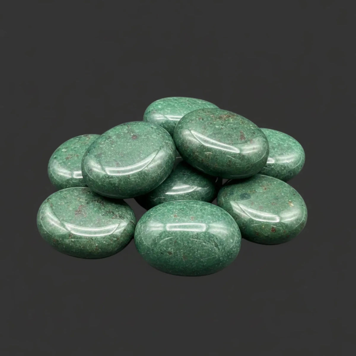 Cut and polished pieces of green bloodstone.