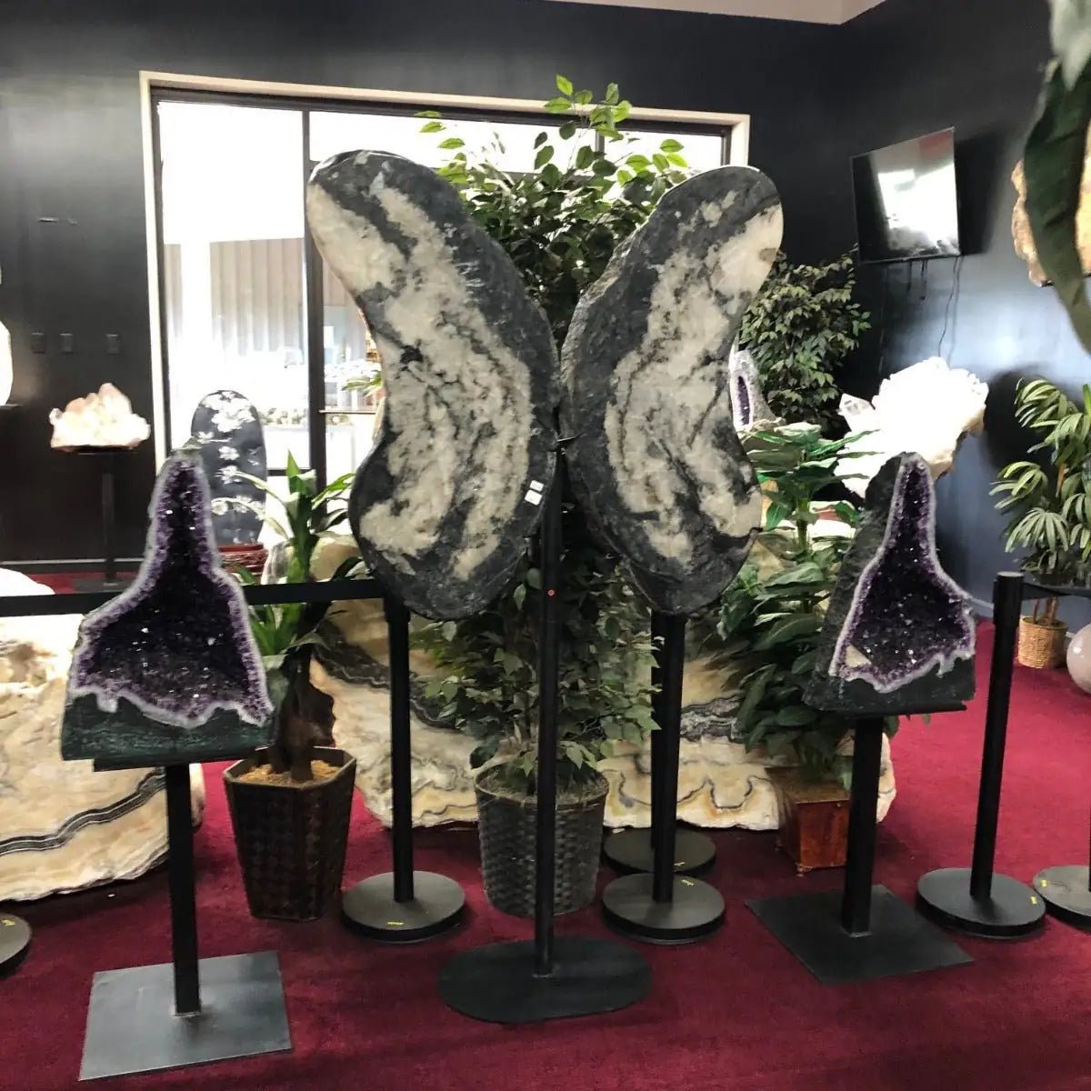 Carved Mineral Wings Emerald In A Room