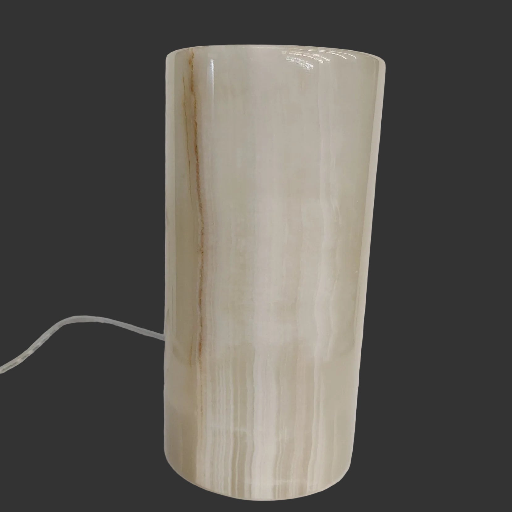 This is the polished cream-colored Onyx table lamp, with the lamp turned off.