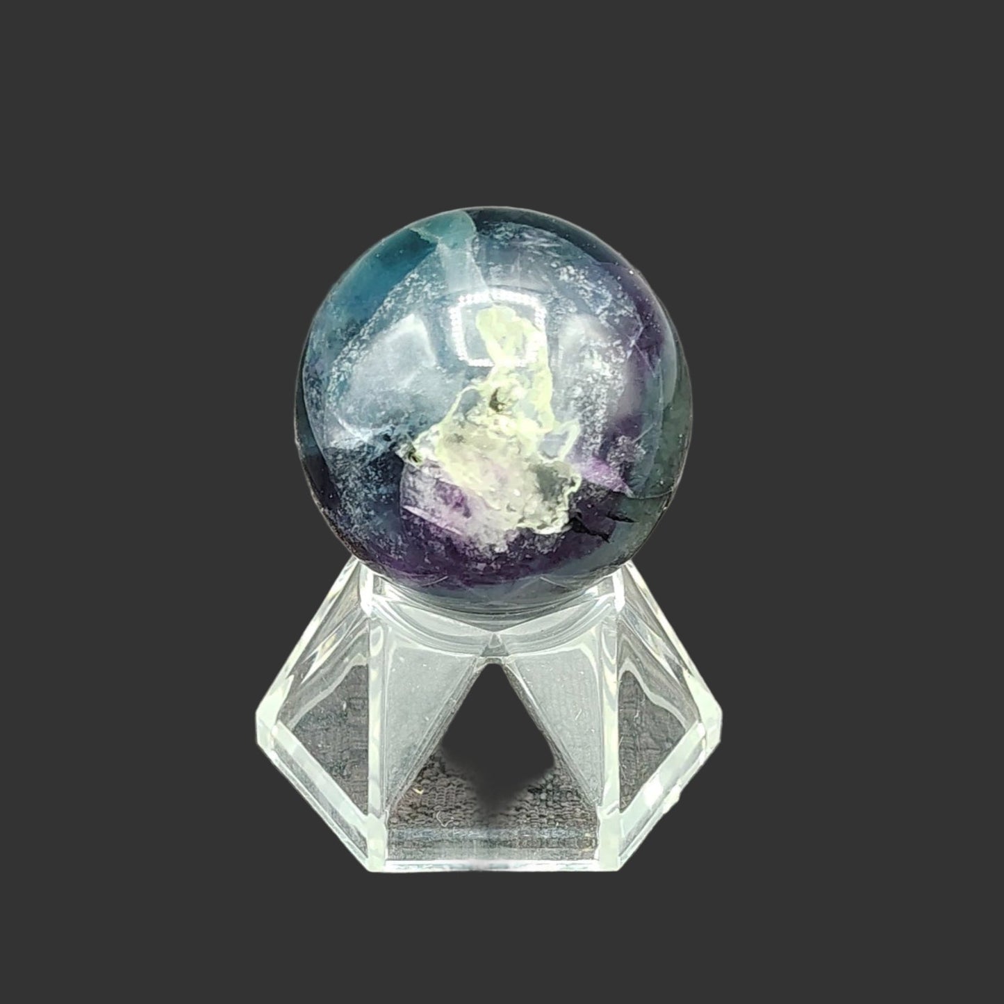 This is the front view of this small polished fluorite sphere