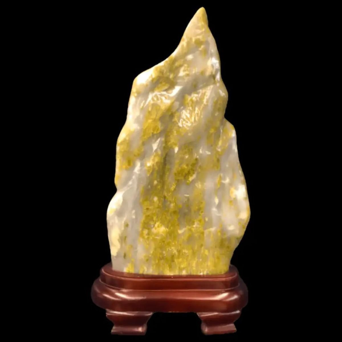 Carved Serpentine on a wood stand, green and white natural stone 