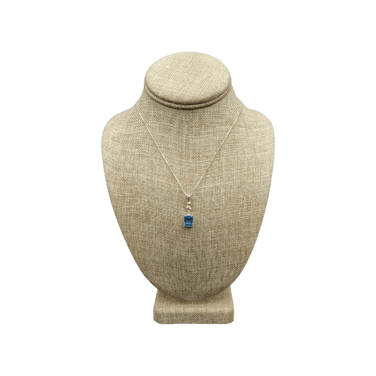 This is the front view of this Sterling Silver cat and blue Topaz pendant