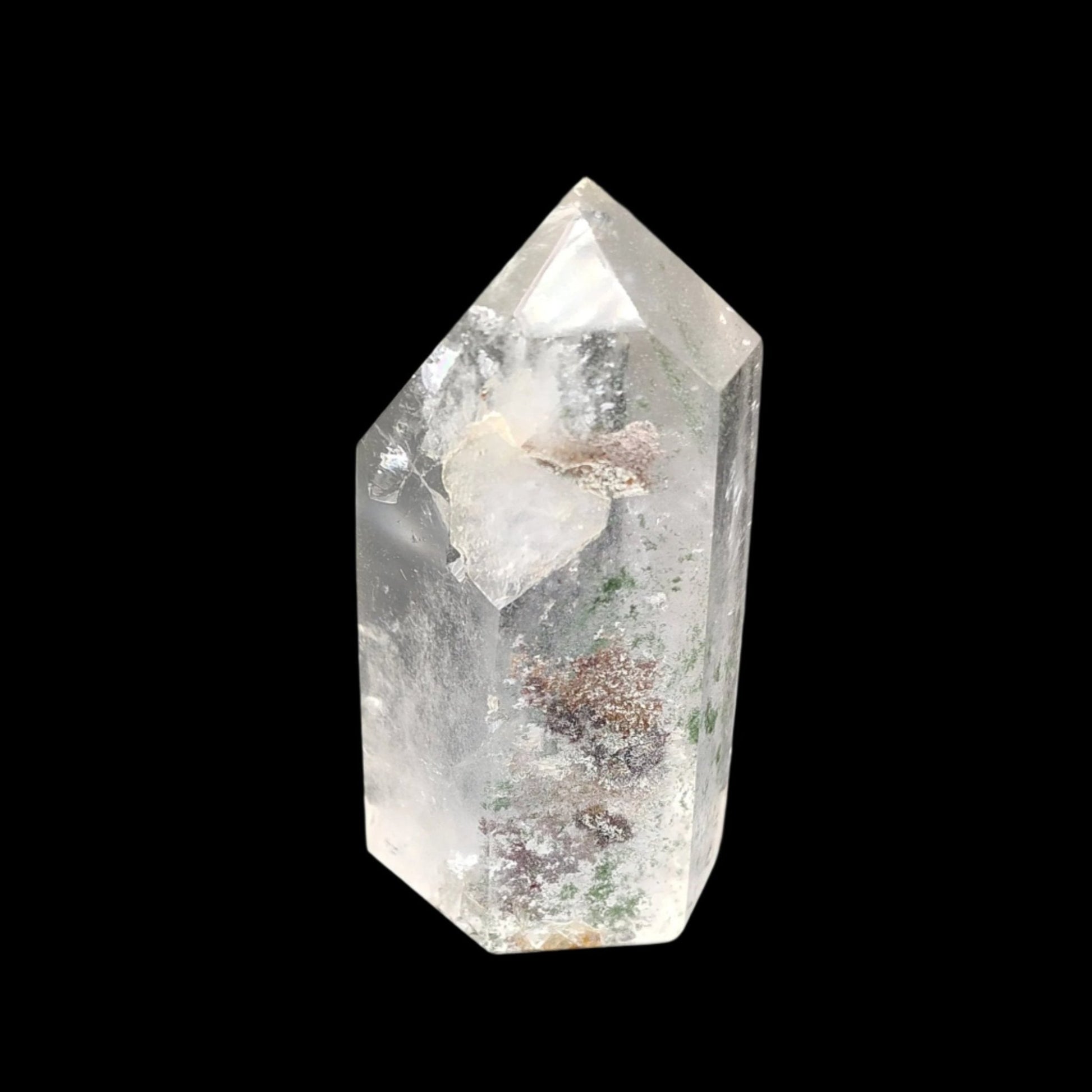 This is the front side of this Brazilian crystal point. It is clear with some green Chlorite throughout and has been polished 