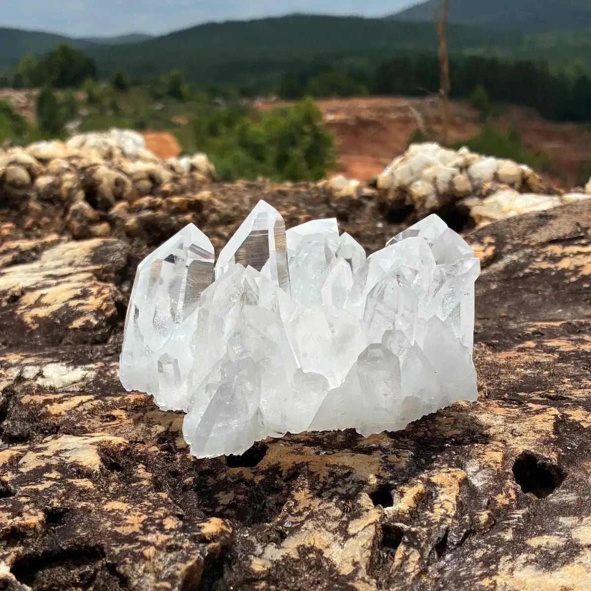 Right side of this Quartz crystal cluster, in a outdoor setting.