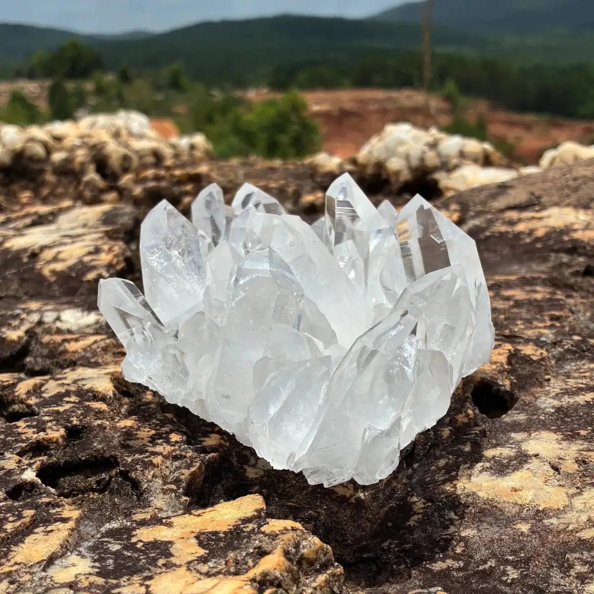 Left side of this Quartz crystal cluster, in a outdoor setting.
