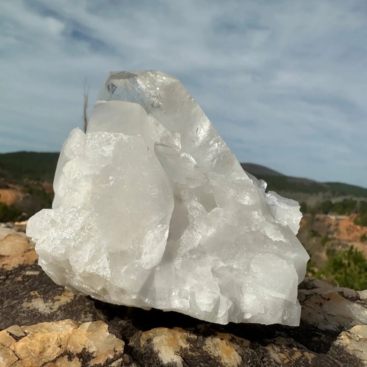 Side View Of Snow, Fairy Dust On Crystal Cluster with sky in background