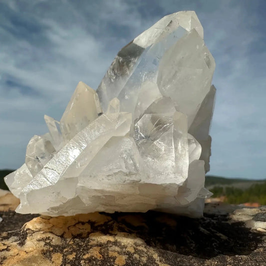Large Point on Cluster of crystals on a boulder