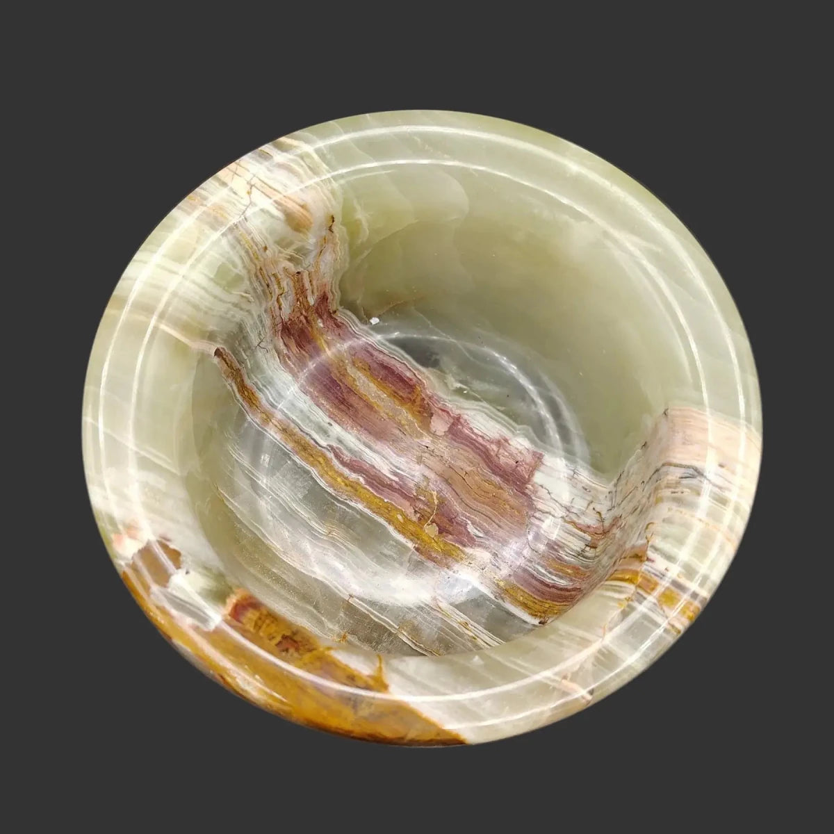 This is the inside view of this polished Onyx mortar.