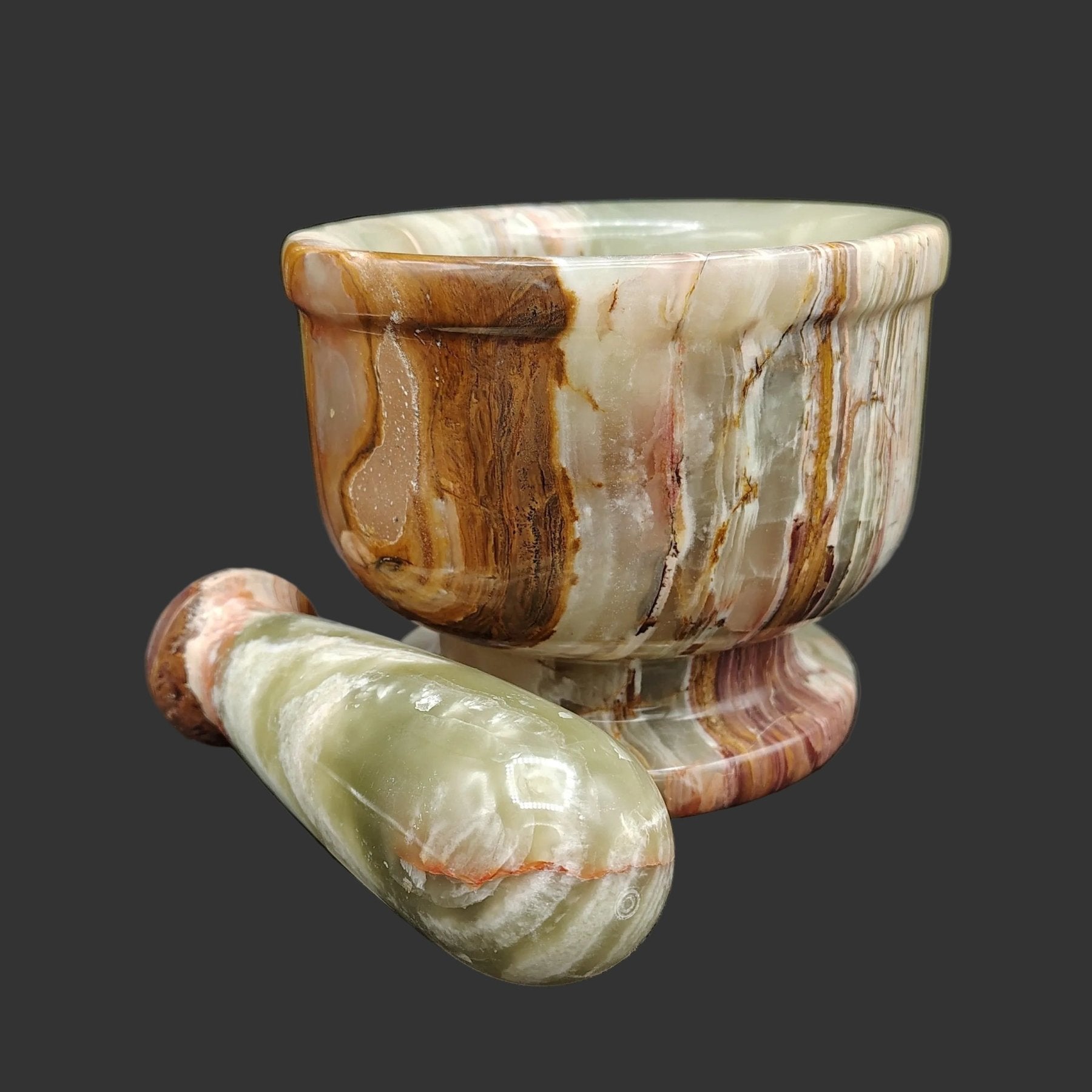 Here is a better view of the pestle, polished green, brown, and cream Onyx.
