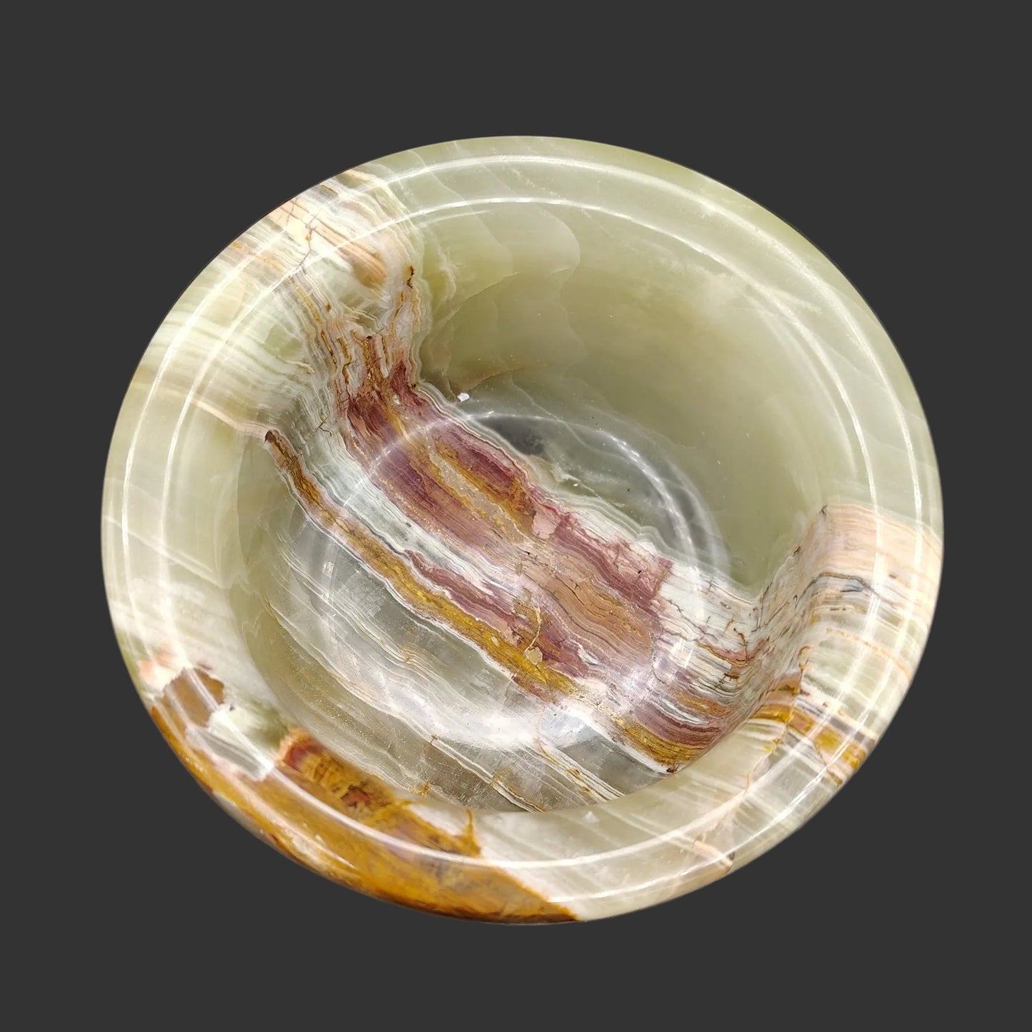 This is the inside view of this polished Onyx mortar.