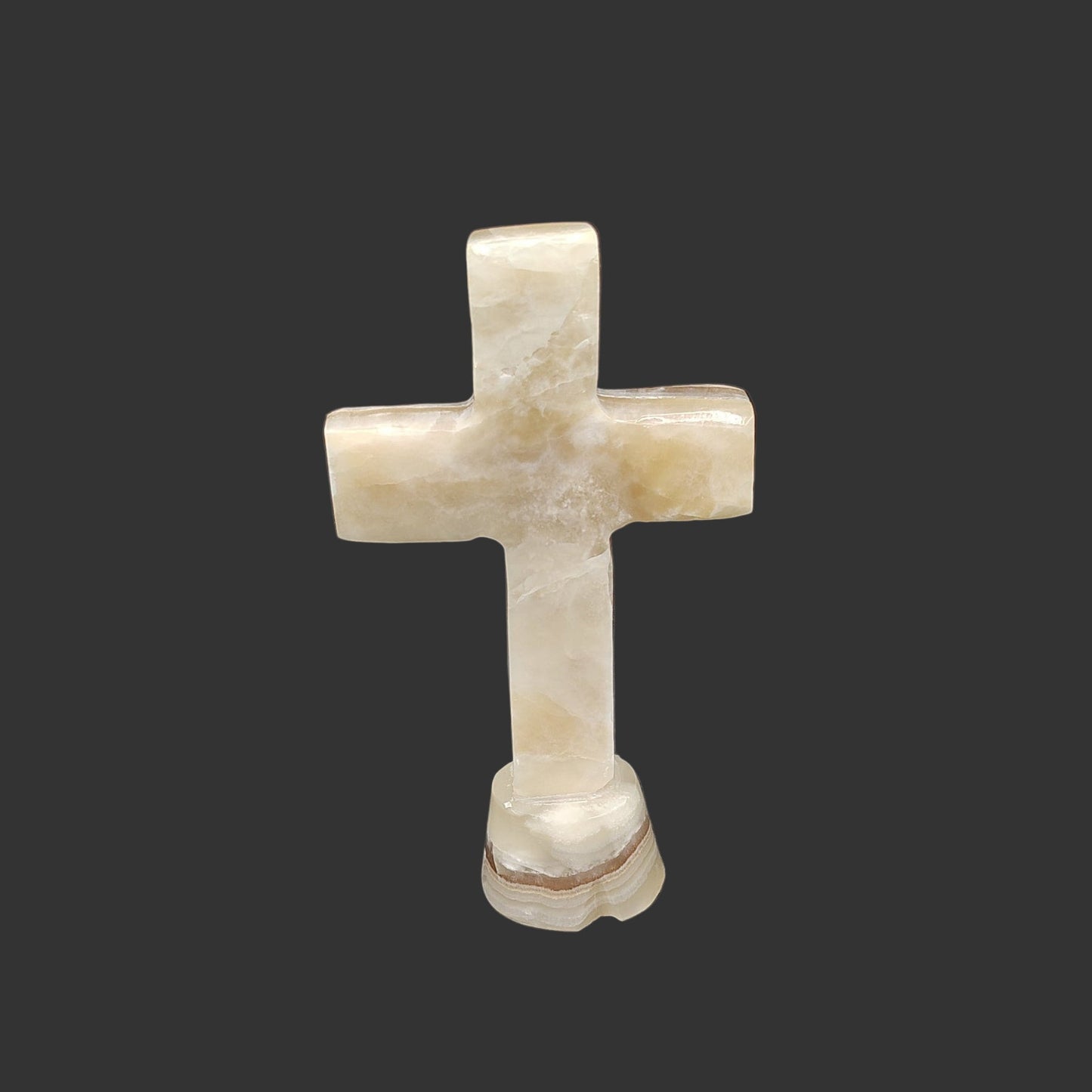 This is the back side of this cream-colored cross.