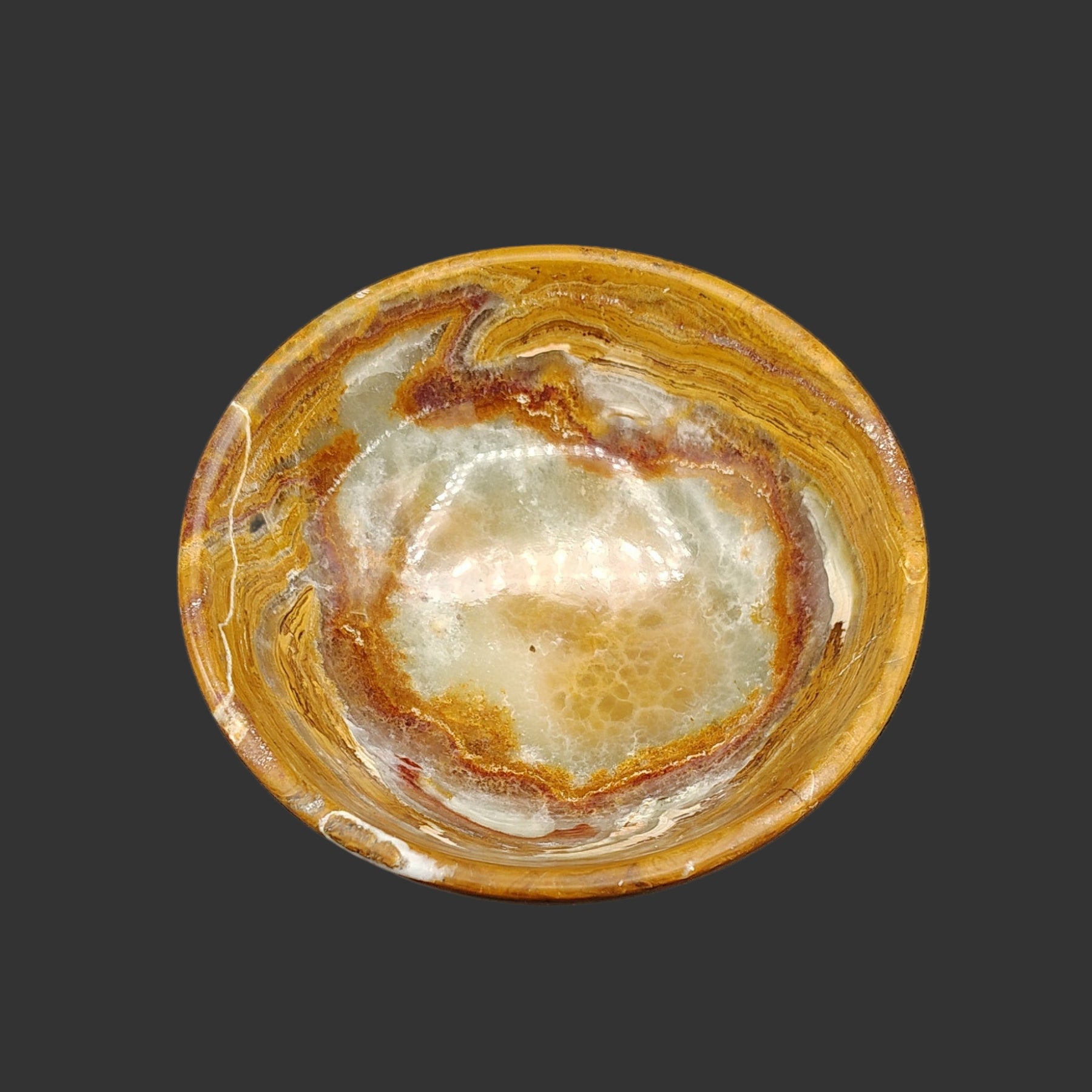 This is what the inside of this small, banded onyx bowl looks like.