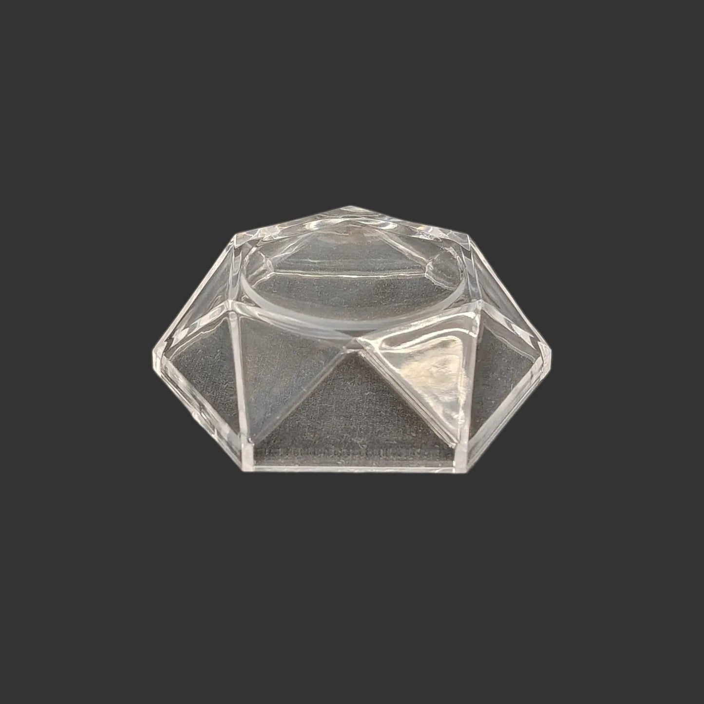 This hexagon acrylic stand is clear and glossy.