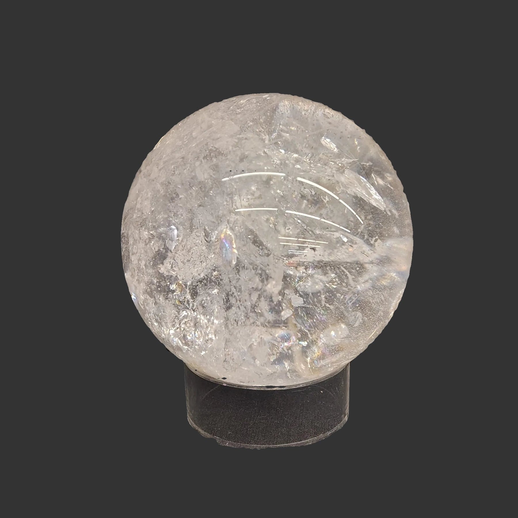 This Quartz crystal ball fits perfectly on this acrylic riser display stand.