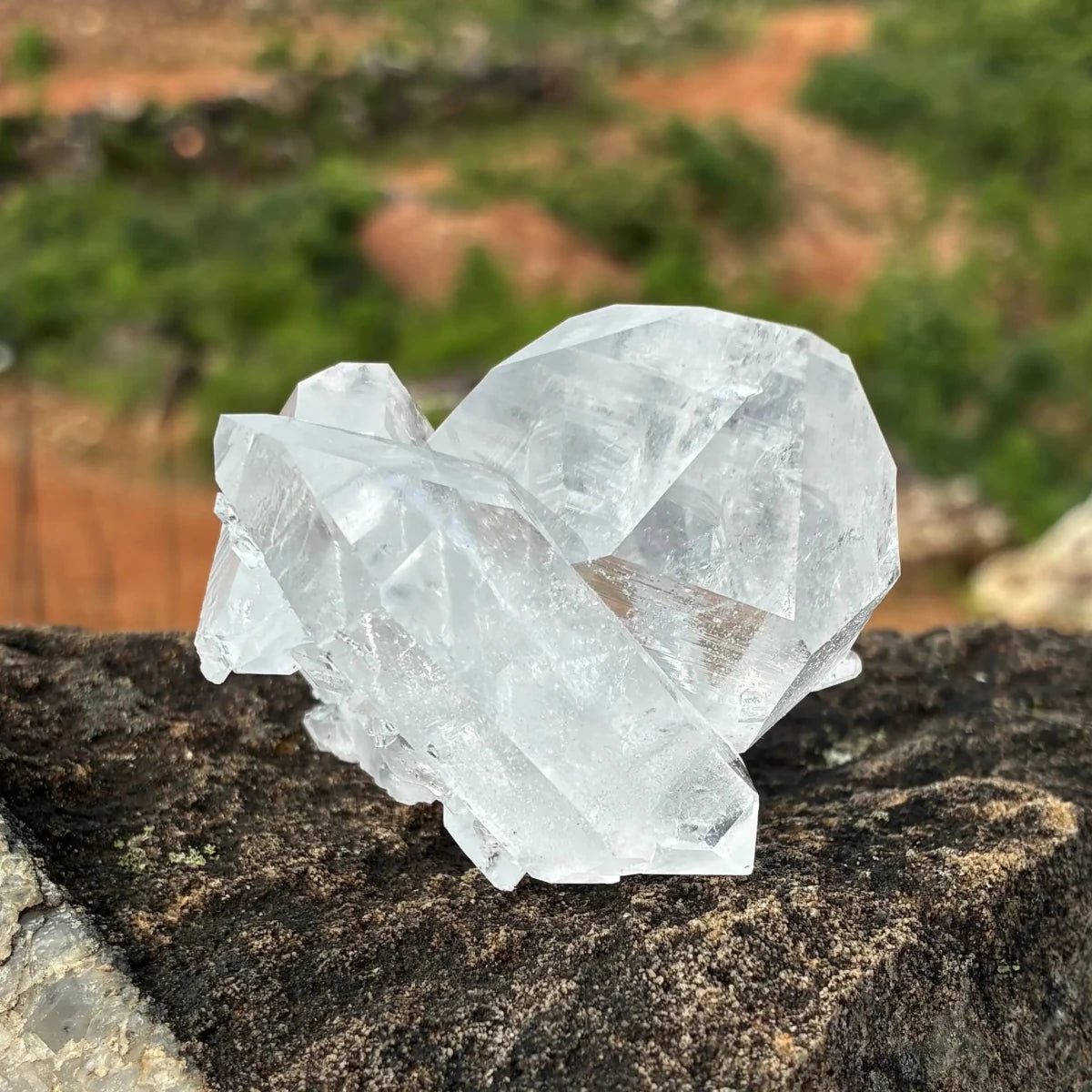 Left side of this double terminated Quartz crystal cluster outdoors.