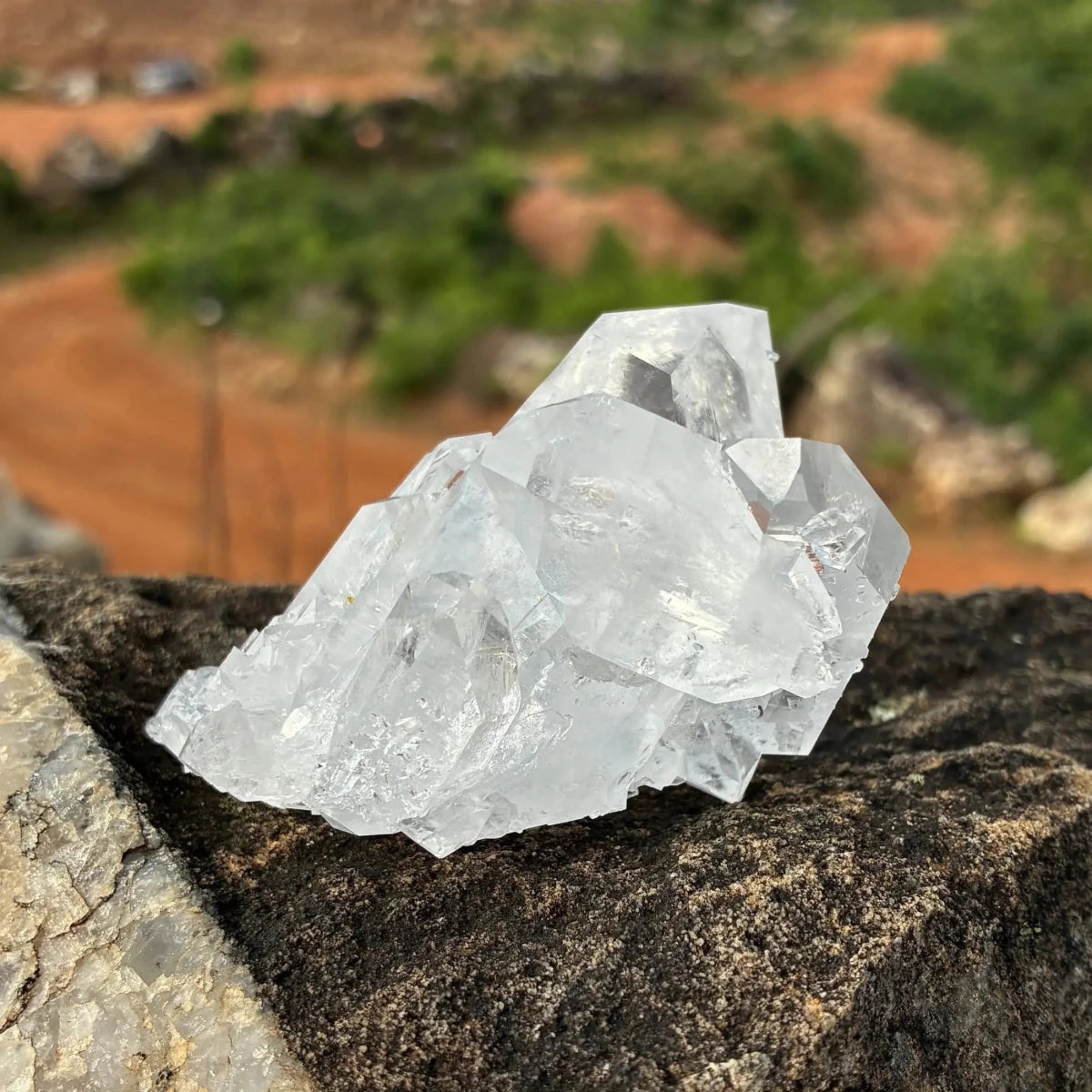 This is the front side of this double terminated Quartz cluster outdoors.