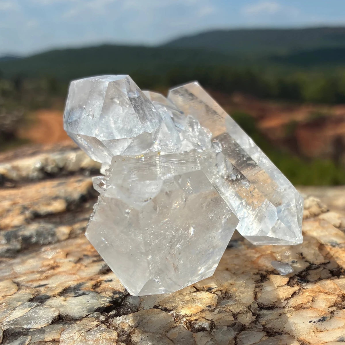 This is the left side of this double-terminated quartz cluster, on a boulder outdoors.