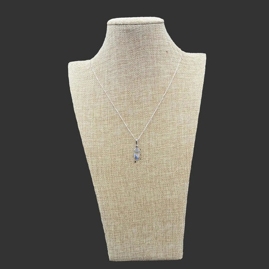 Sterling Silver box chain with a Dumotierite pendant attached.