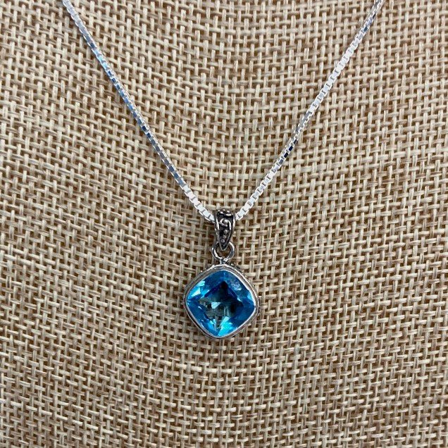 Elegant Sterling Silver And Blue Topaz Necklace