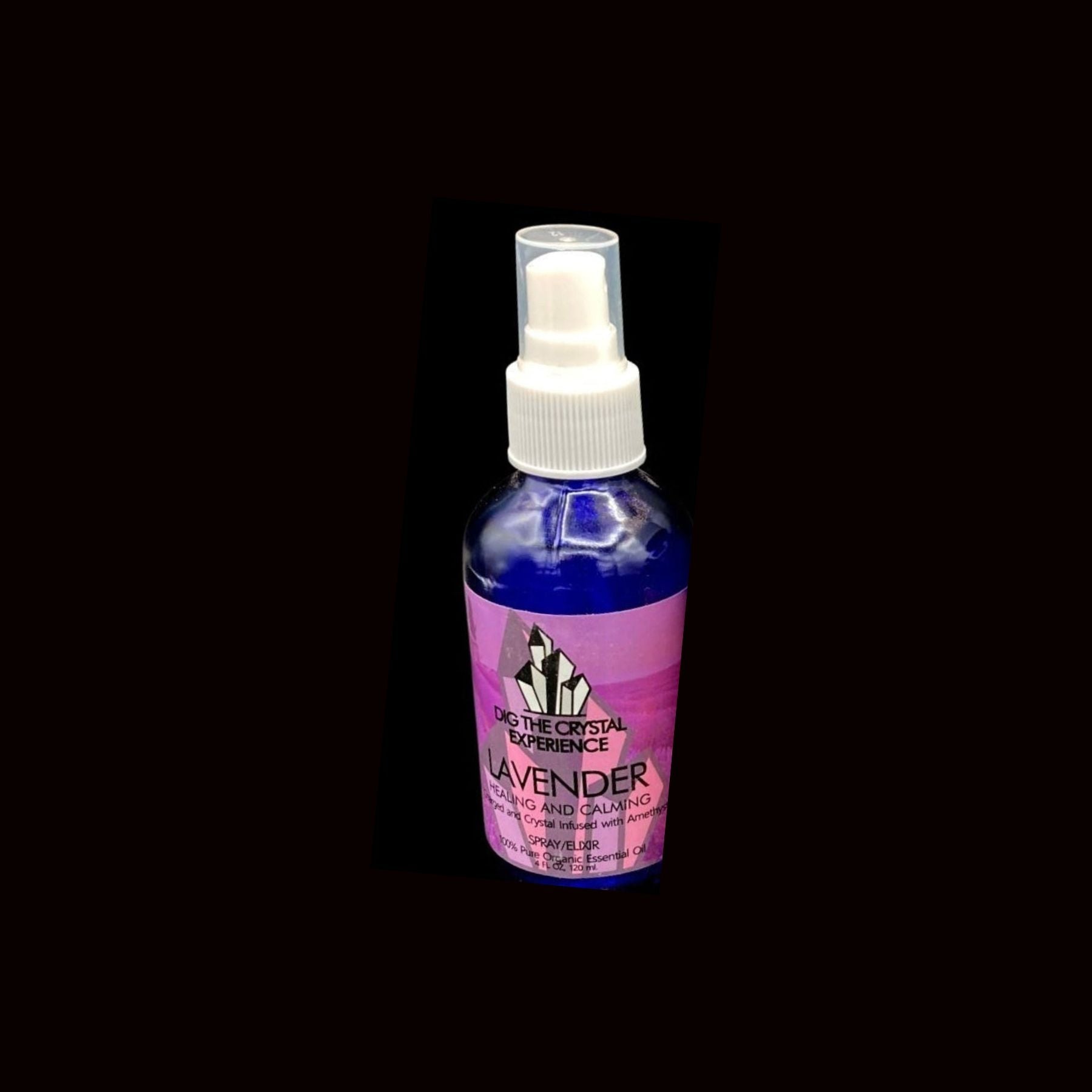 Bottle of lavender spray with a black background
