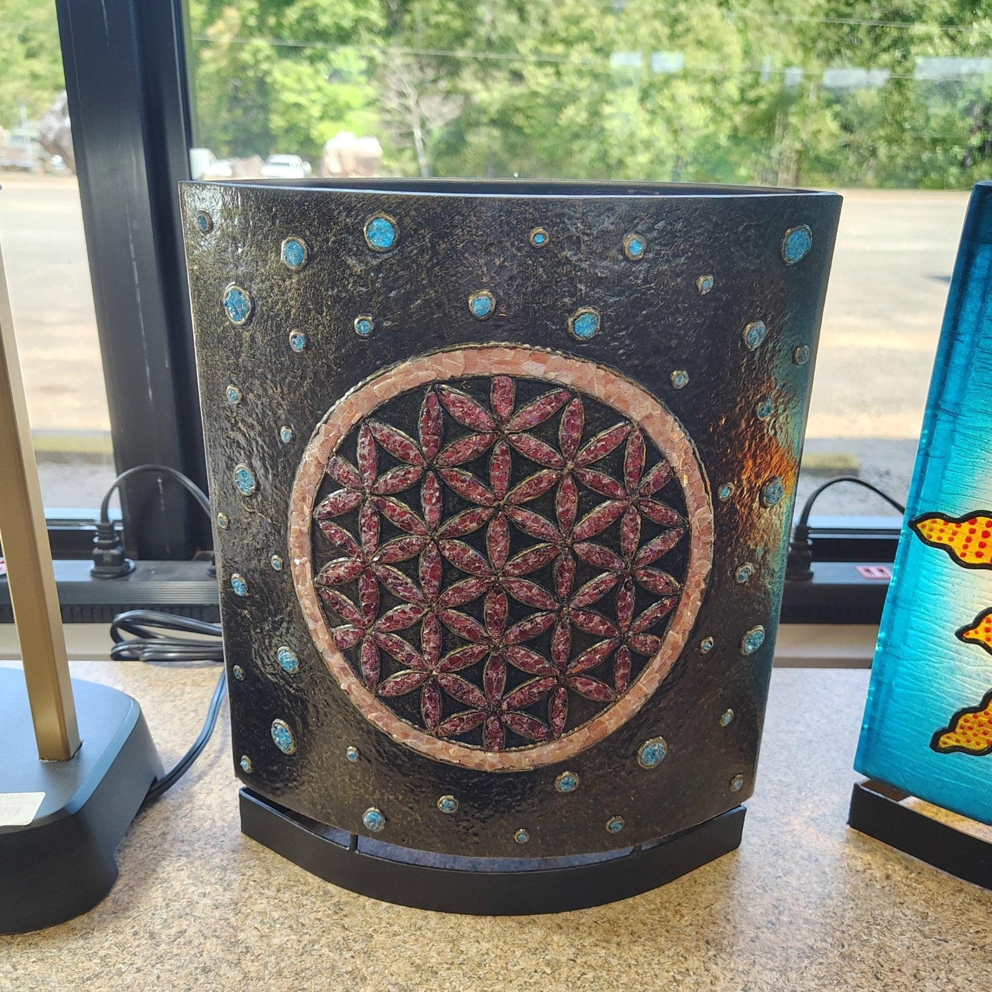 Flower of life resin table lamp with gemstones and acrylic with the light turned off